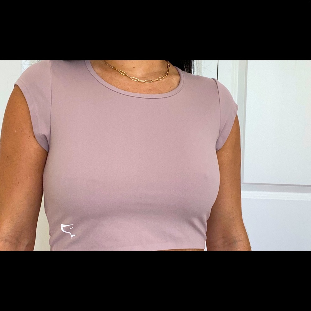 Gymshark crop top, size medium. Color beige.